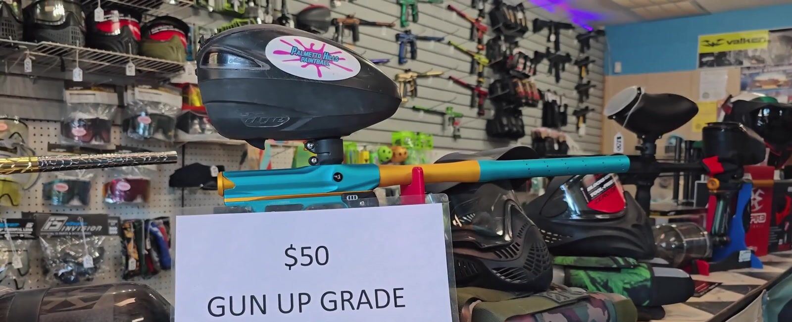 The Palmetto Hills pro shop counter — markers, masks, and the upgrade bench