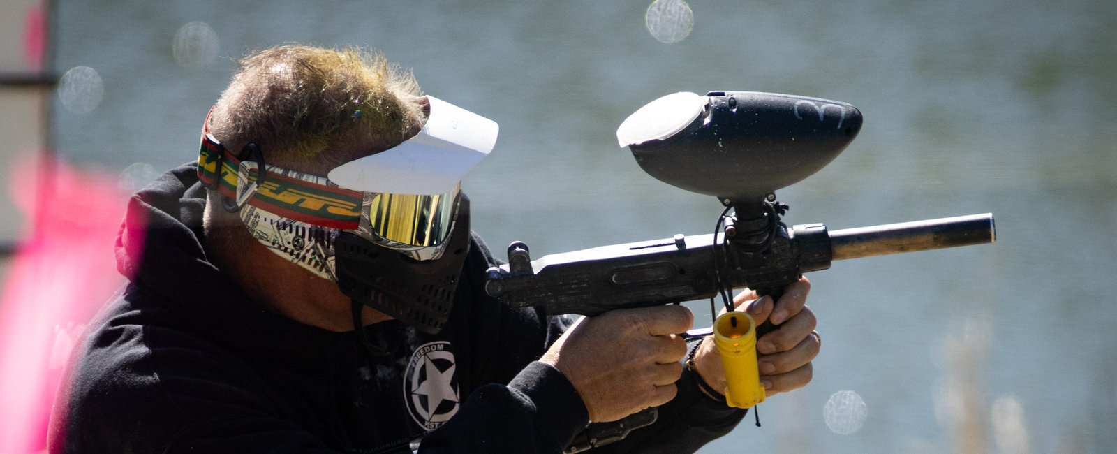 Player running a Palmetto Hills rental marker at the pond field