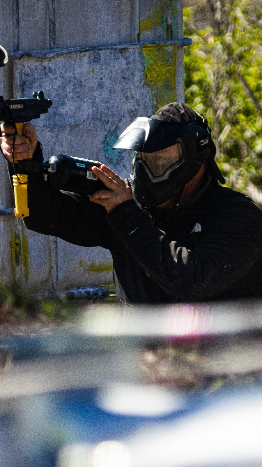 Player shouldering a rental marker at the castle structure